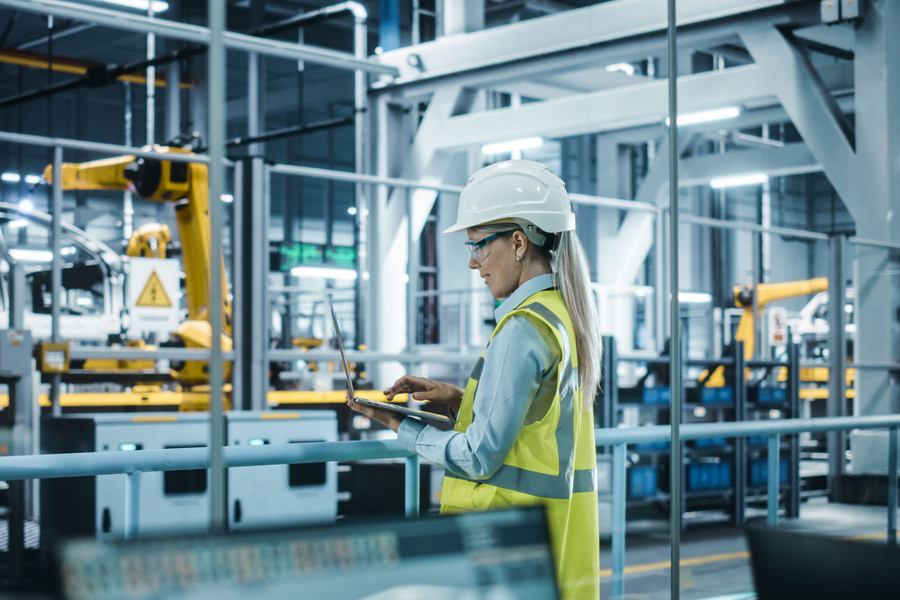 Female engineer in factory.