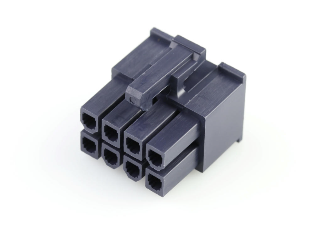 Mini-Fit Jr. receptacle housing shown. Asymmetric cavity shape ensures mating occurs in only one orientation.